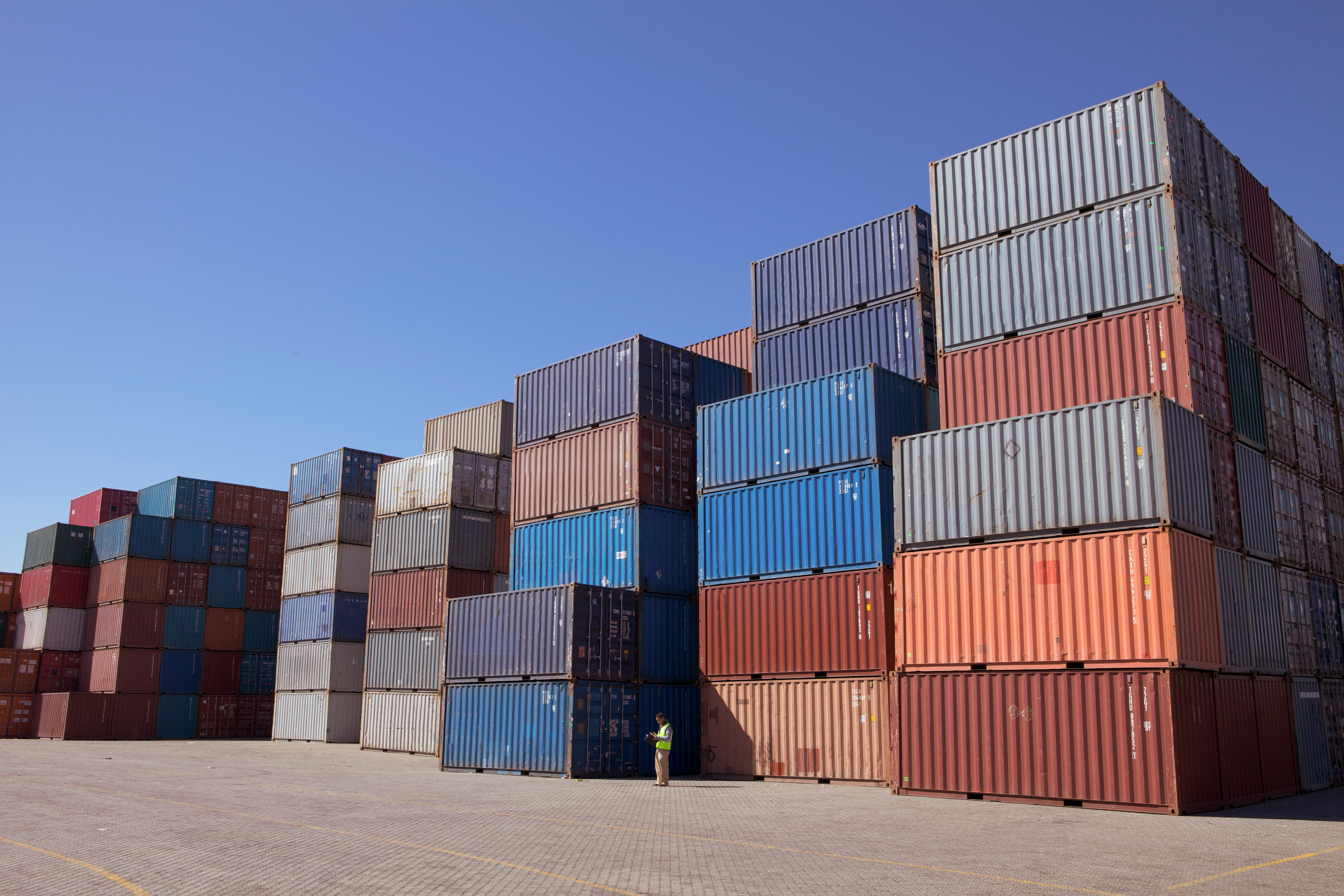 Rows of stacked shipping containers